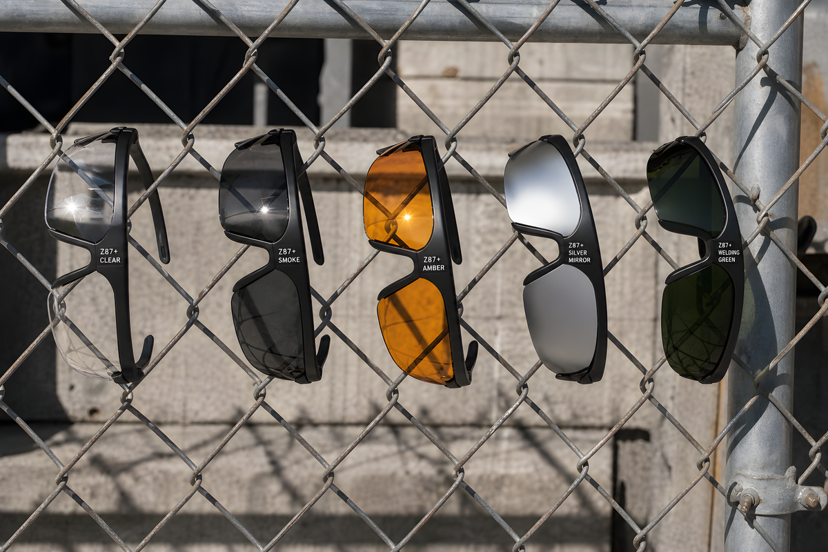 GRAFT the fence line: five pairs clipped along a chain-link fence in shade order, sun through No extra text beyond what is specified, no watermarks, no invented logos, coherent type, no garbled letters